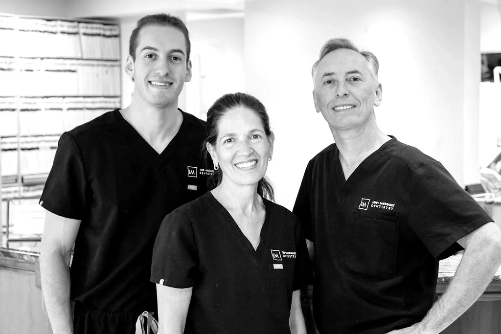 The three doctors of Lipari & Mangiameli Dentistry together in the office.